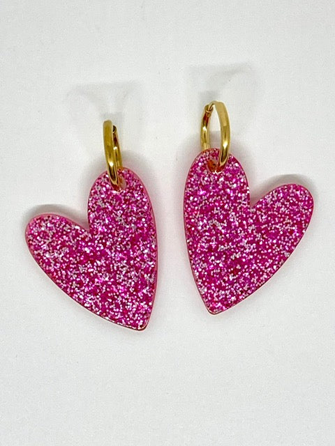 Boucles d’oreilles rose à paillettes