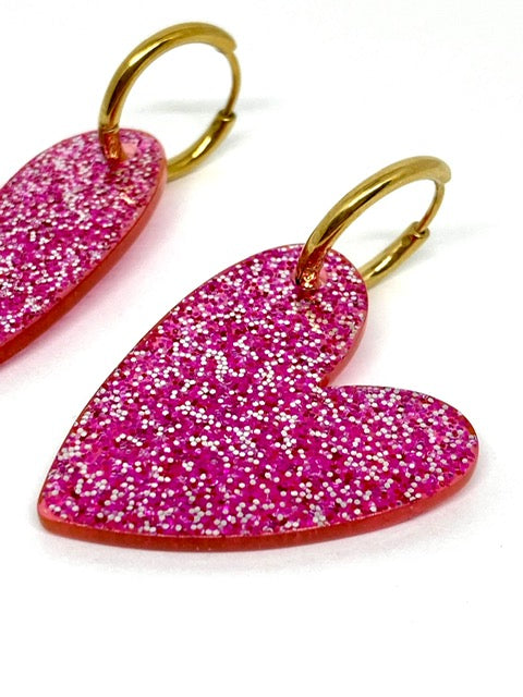 Boucles d’oreilles rose à paillettes