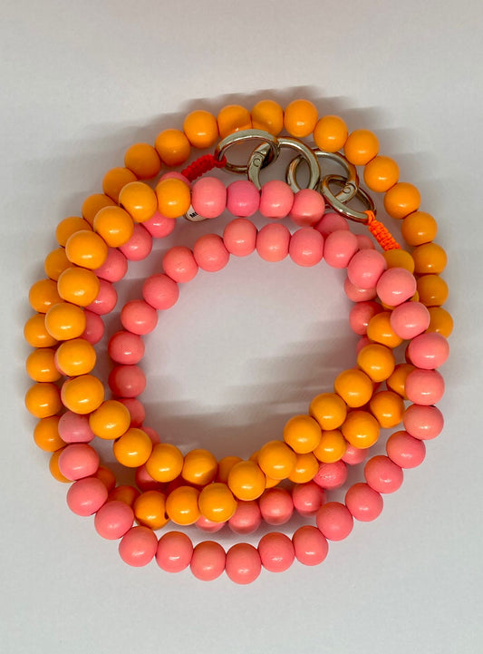Chaîne de téléphone en perles de bois orange & rose - Colombie