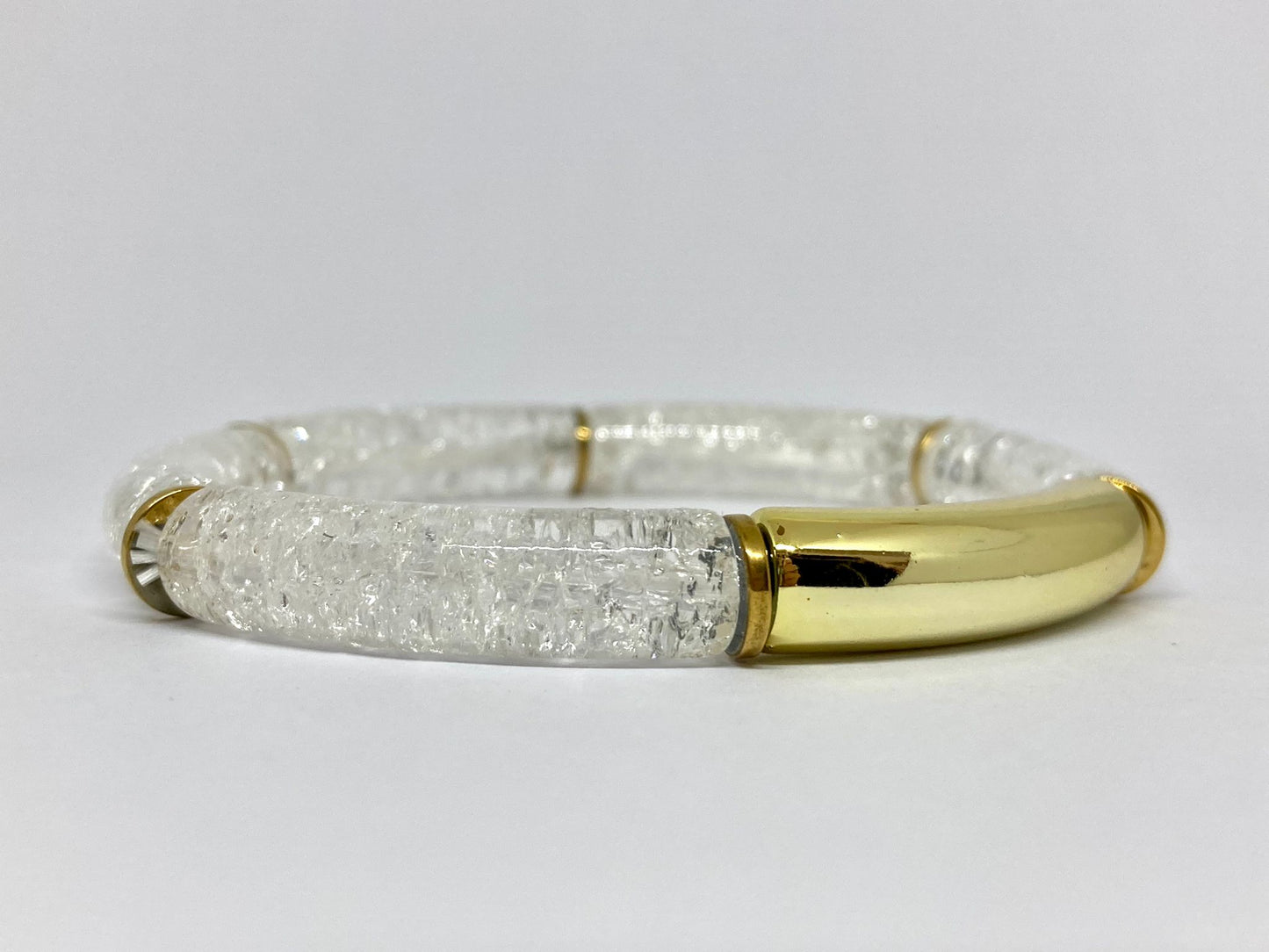 Bracelet tube doré et translucide