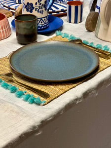 Set de table avec pompons bleu turquoise